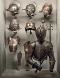 Weapons Room with Armours, Muskets, Swords, Halberds and Helmets at Poldi Pezzoli Museum in Milan in Italy