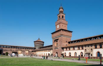 The Weapons's Square and the Filarete Clock Tower of Castello Sforzesco in Milan in Italy